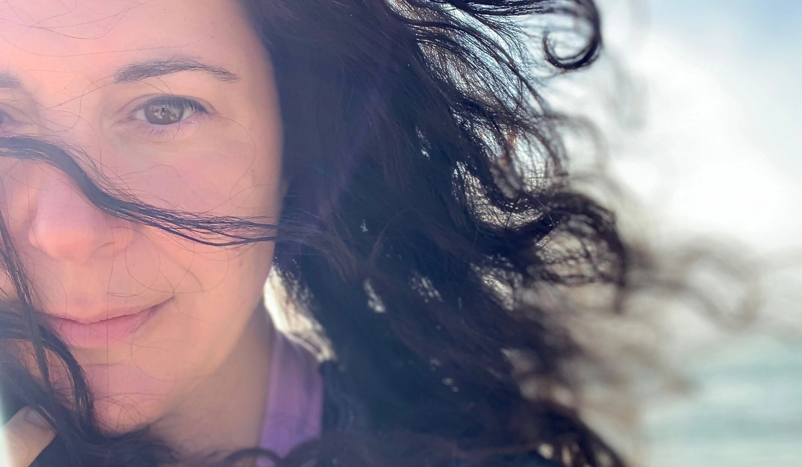 Mel leading a Full Moon Yoga ceremony with candles